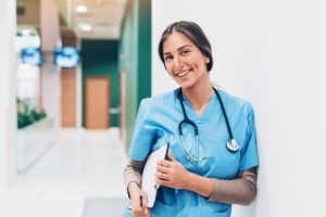 LPN smiling confidently ready for her travel nurse assignment