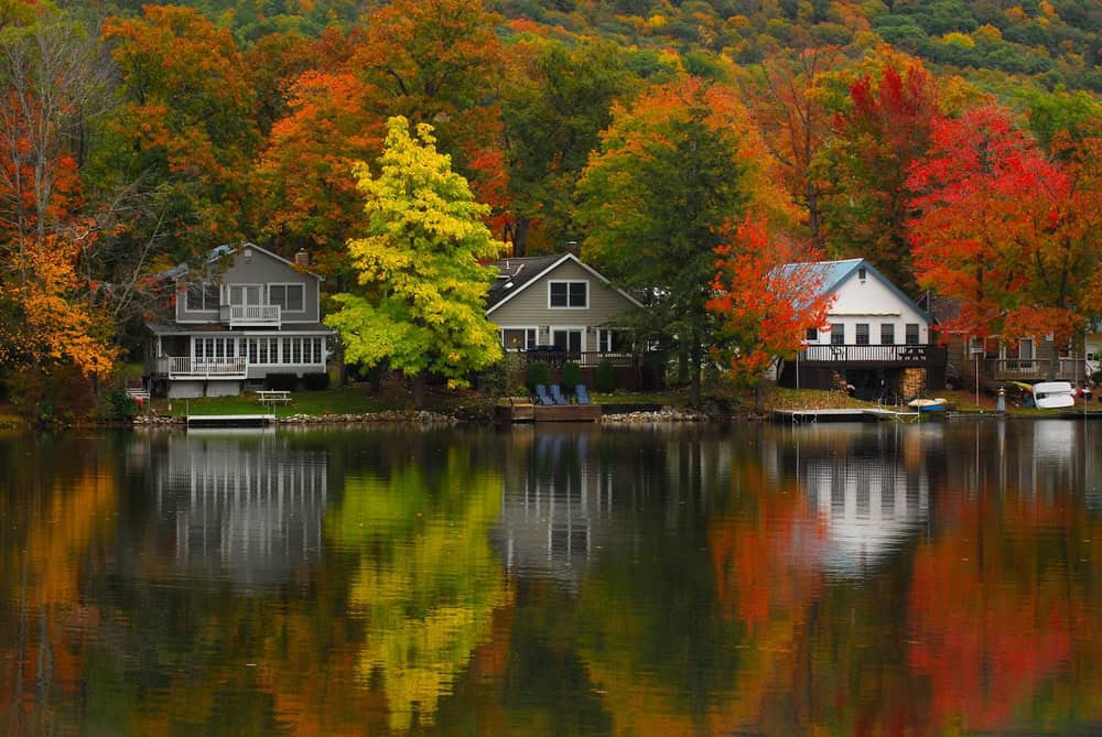 Vermont houses by a lake in New England during fall