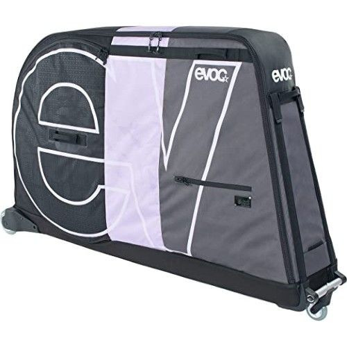 Cyclist packing a bike into a soft bicycle travel bag