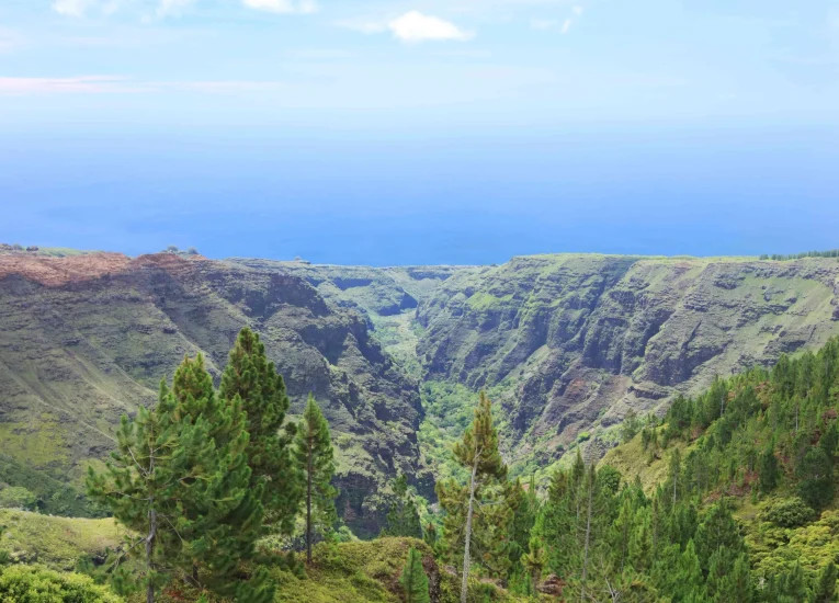 Panoramic view from a Nuku Hiva plateau showcasing the island's rugged terrain