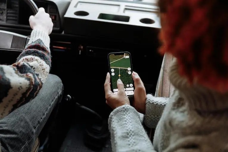 People using GPS on a cell phone