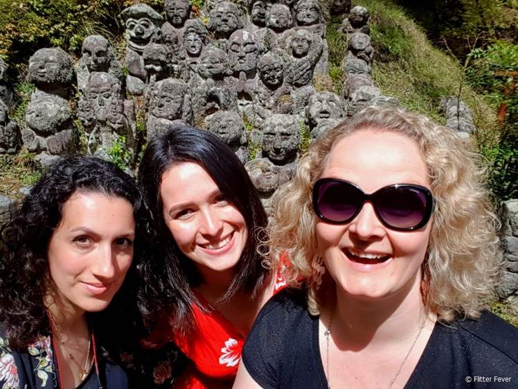 Friends enjoying a scenic boat ride in Ha Long Bay