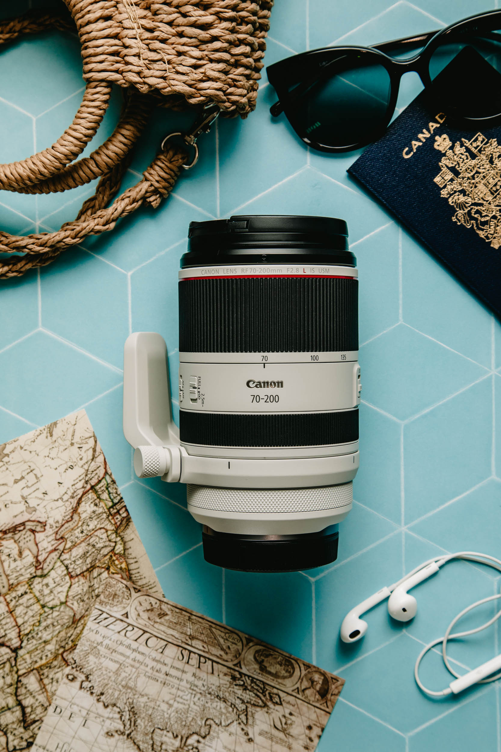 A collection of Canon RF lenses displayed against a backdrop of iconic Vietnamese landmarks, symbolizing the ideal gear for capturing the essence of travel in Vietnam.
