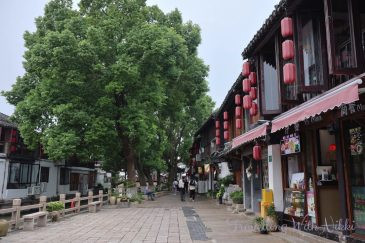 Walking Along Caohe Street Towards Lang Bridge